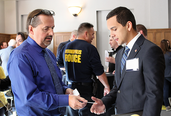 Veteran employer and student talking