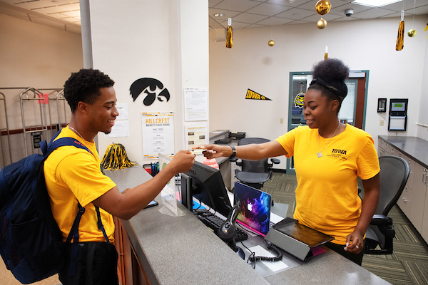 Student worker interacting with student