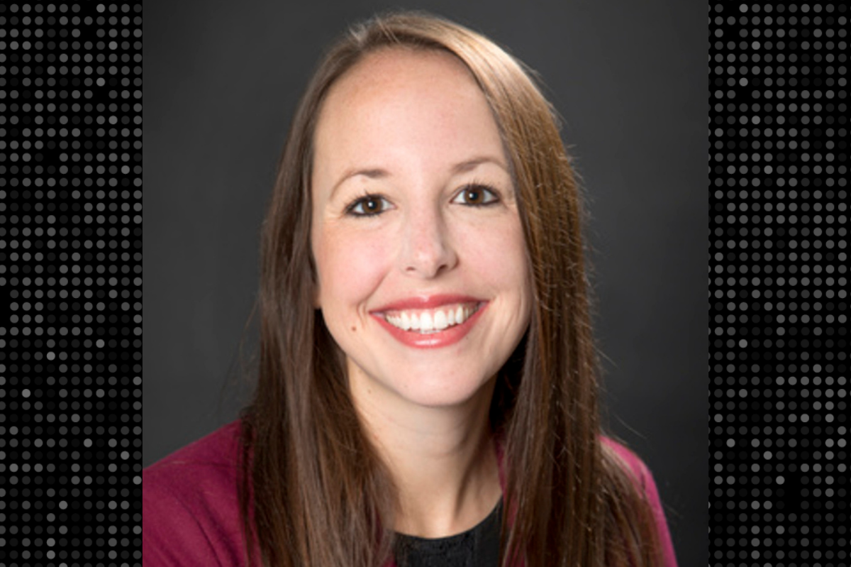 Portrait of Emily Thomas with a black and white textured background