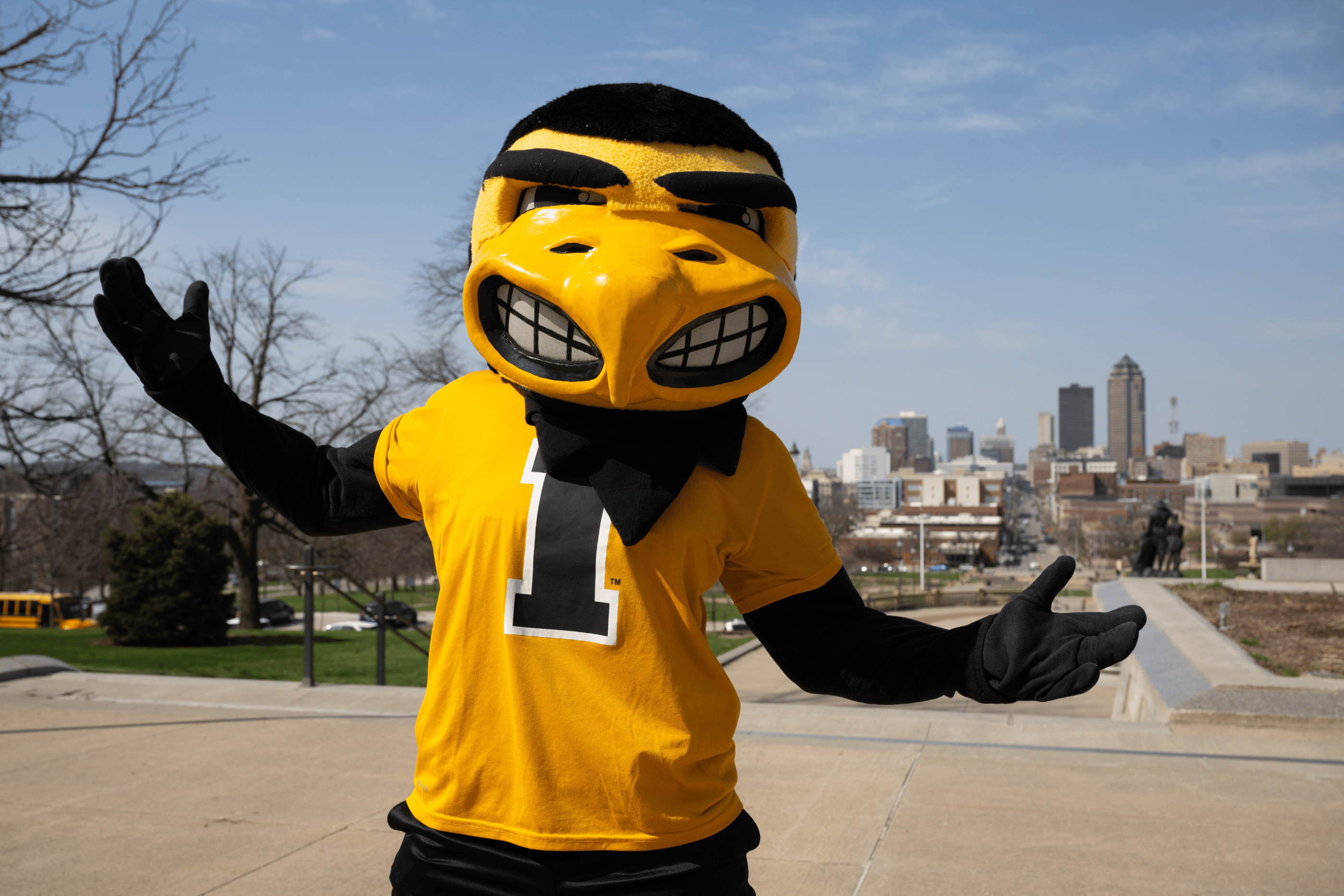 Herkey in the foreground with Iowa City skyline in the background