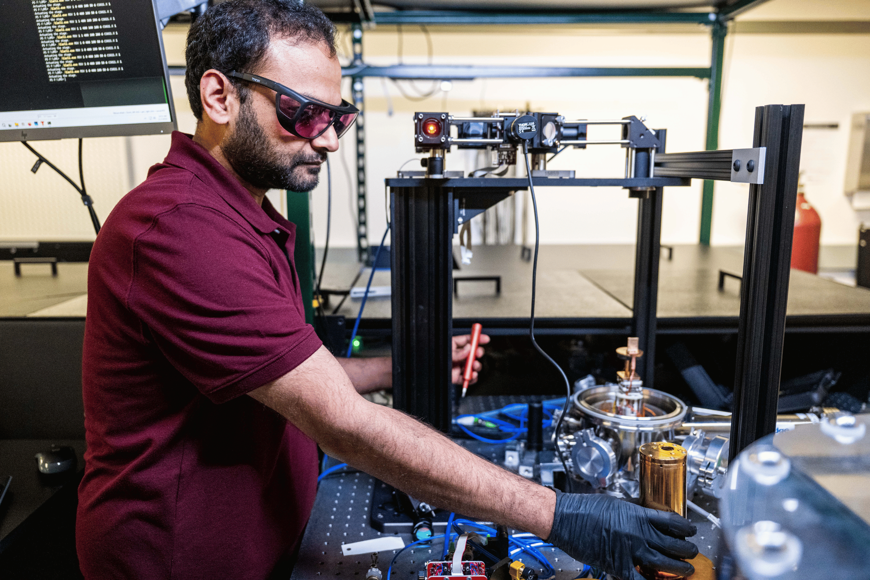 Casey Deroo in the Quantum Light Control Lab