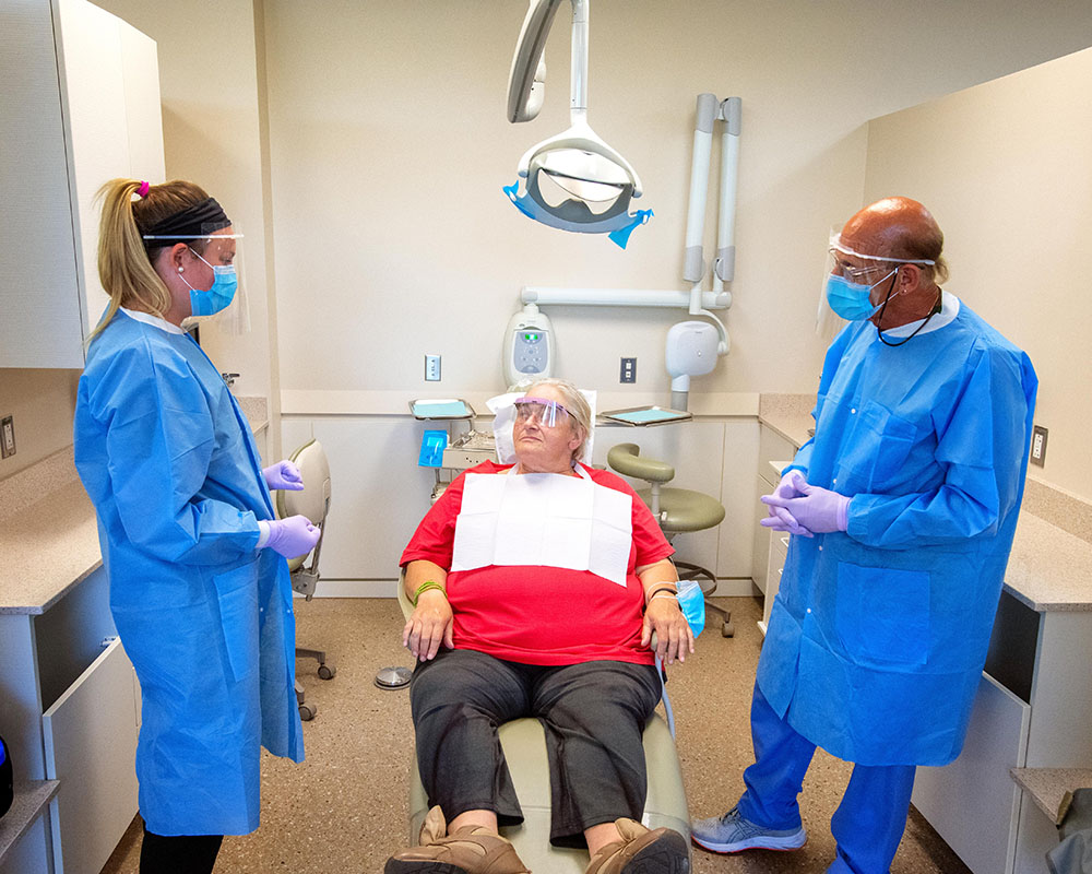 Dental providers with patient