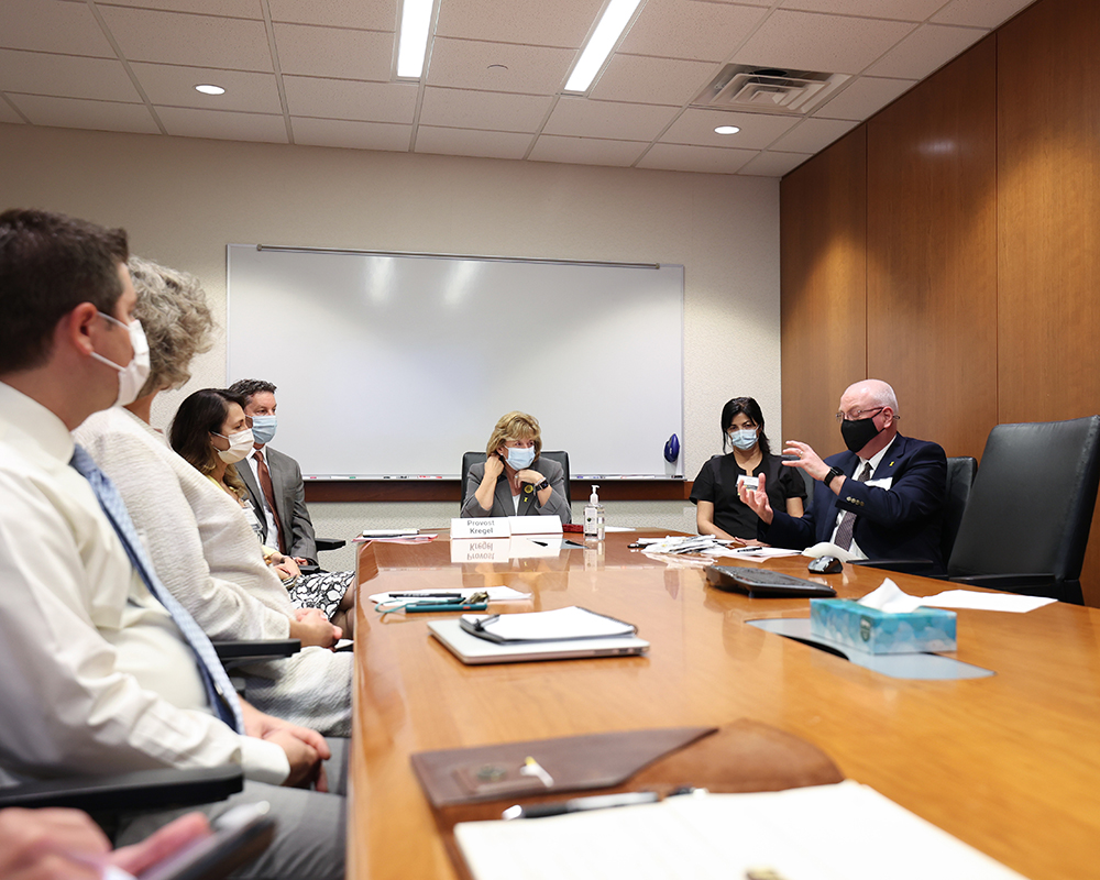 President Wilson in the Dean's Conference Room with the Executive Leadership Team of the College of Dentistry