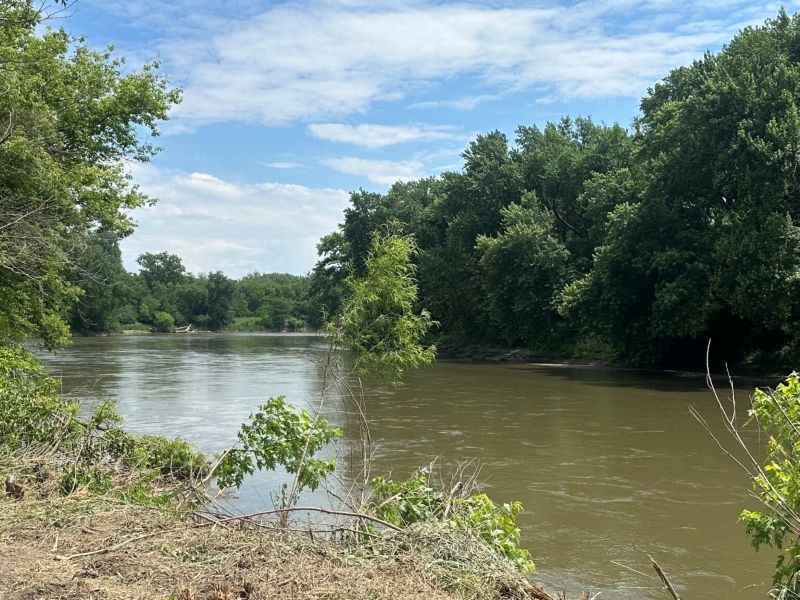 The Raccoon River as it flows past the Bill Riley trail in Des Moines