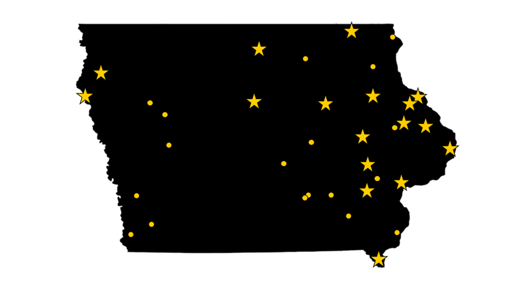 A map of Iowa with gold stars on the towns that have been an IISC partner community.