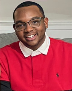 young man in bright red shirt