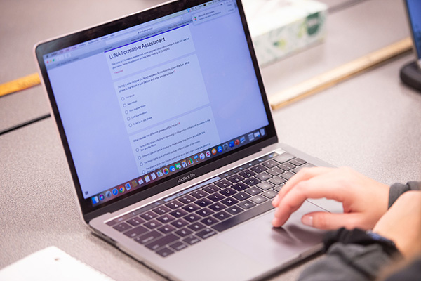 Iowa student accessing their textbook, which was created using Pressbooks.