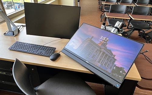 New accessible lecturn and monitors in a UI classroom.