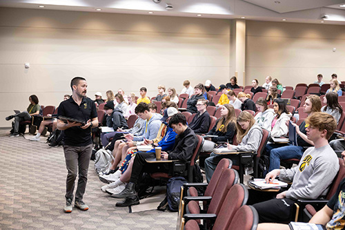 Adam Brummett teaches an intro to chemistry course in Macbride Hall.