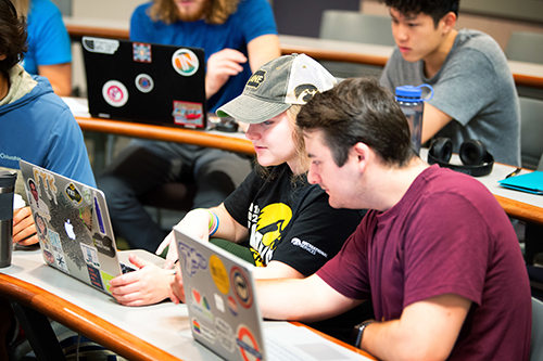 UI students collaborating together.