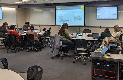 UI faculty and staff participate in a workshop about AI. 