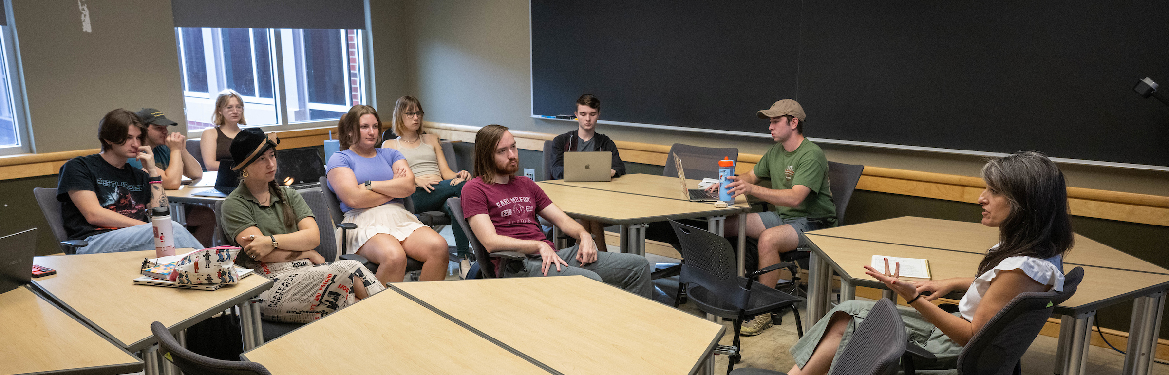 Instructor speaking to their advanced screenwriting class