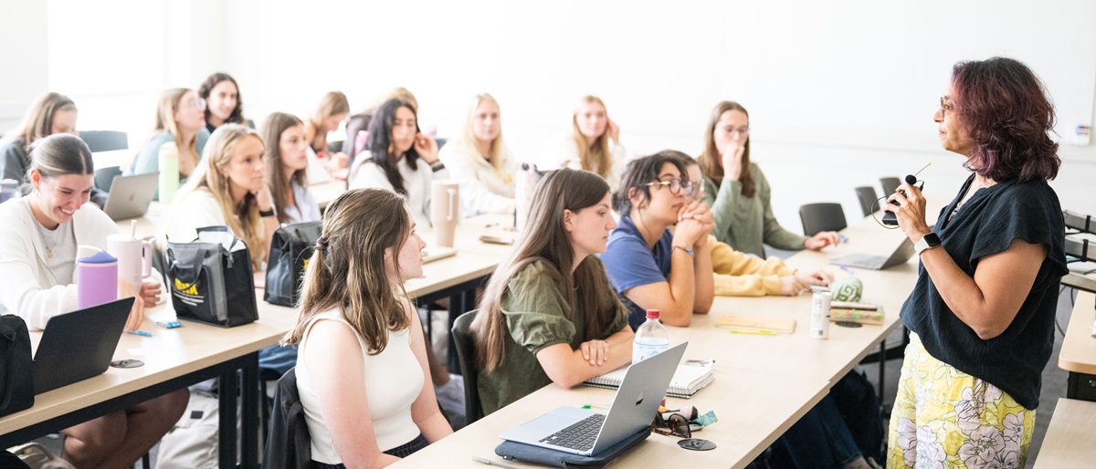 Students listening to their instructor