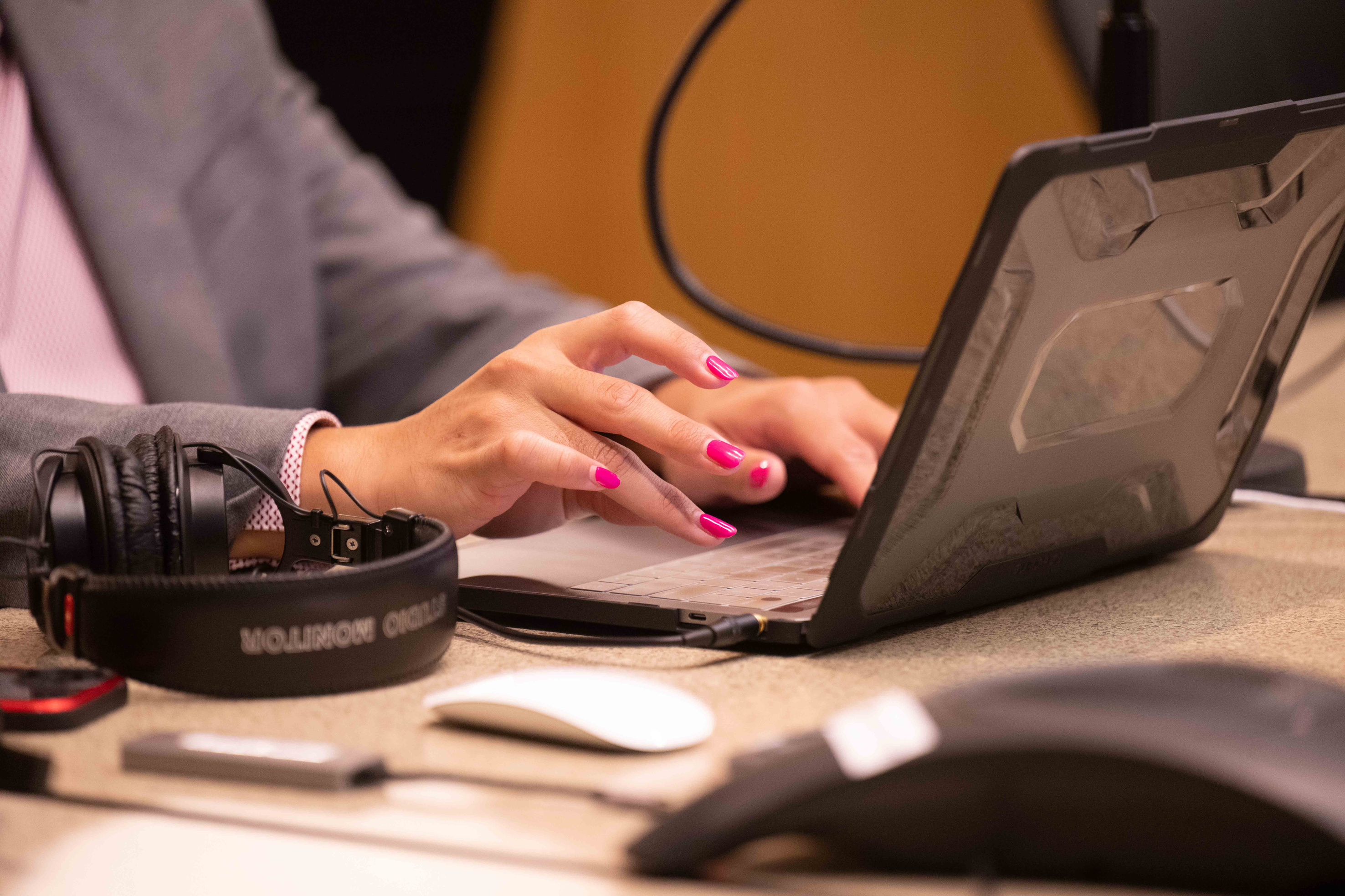 Person typing on computer