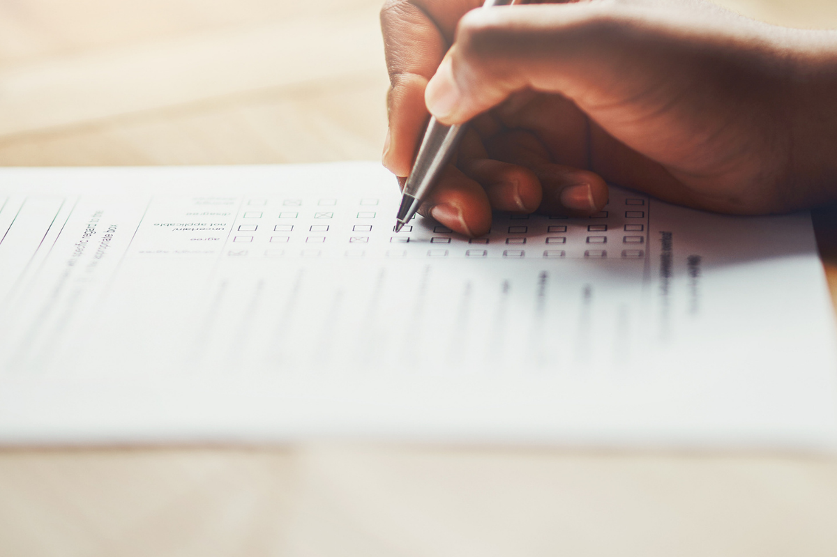 picture of a hand taking a survey