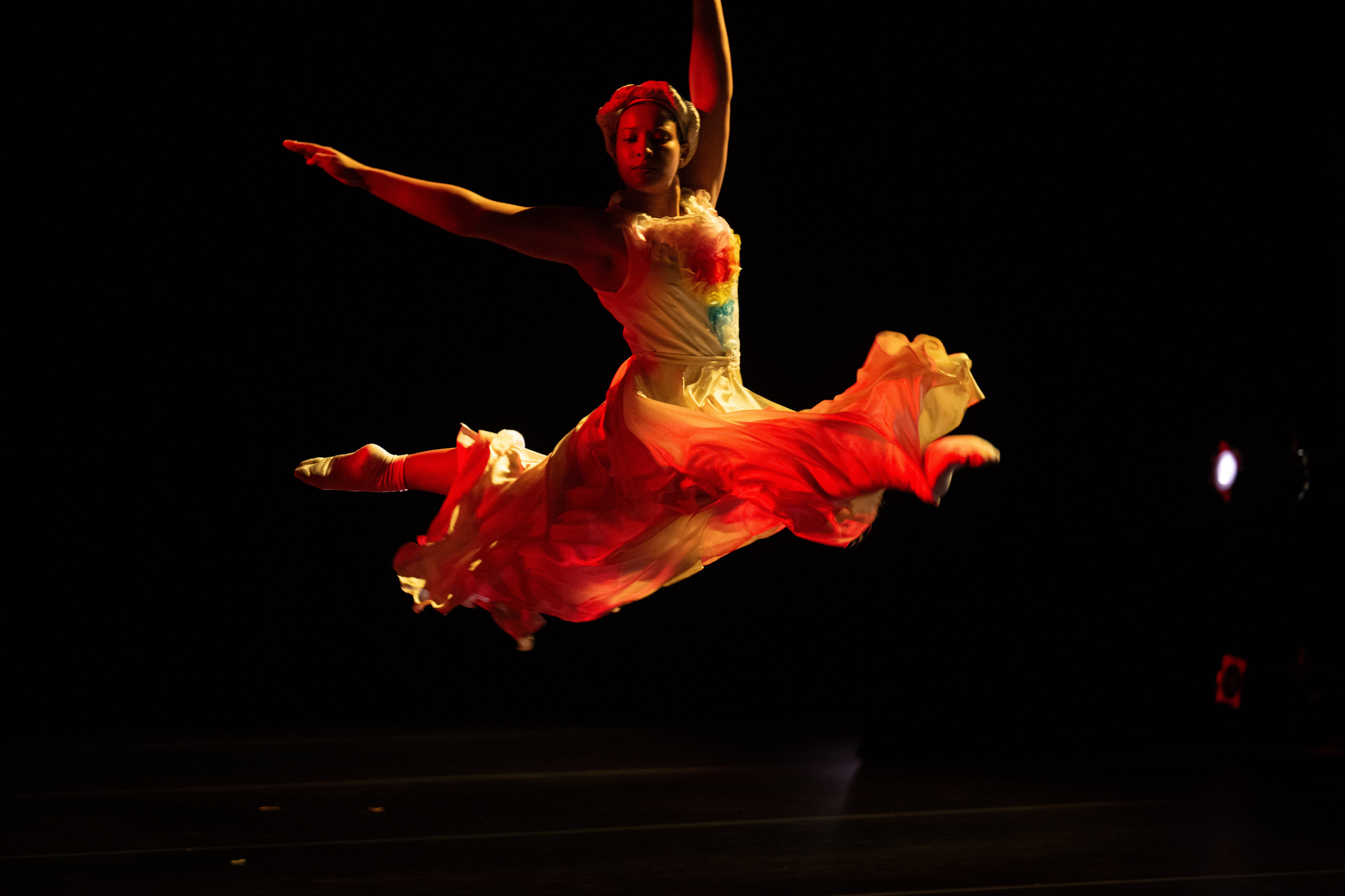dancer performing a grande jet&eacute; 