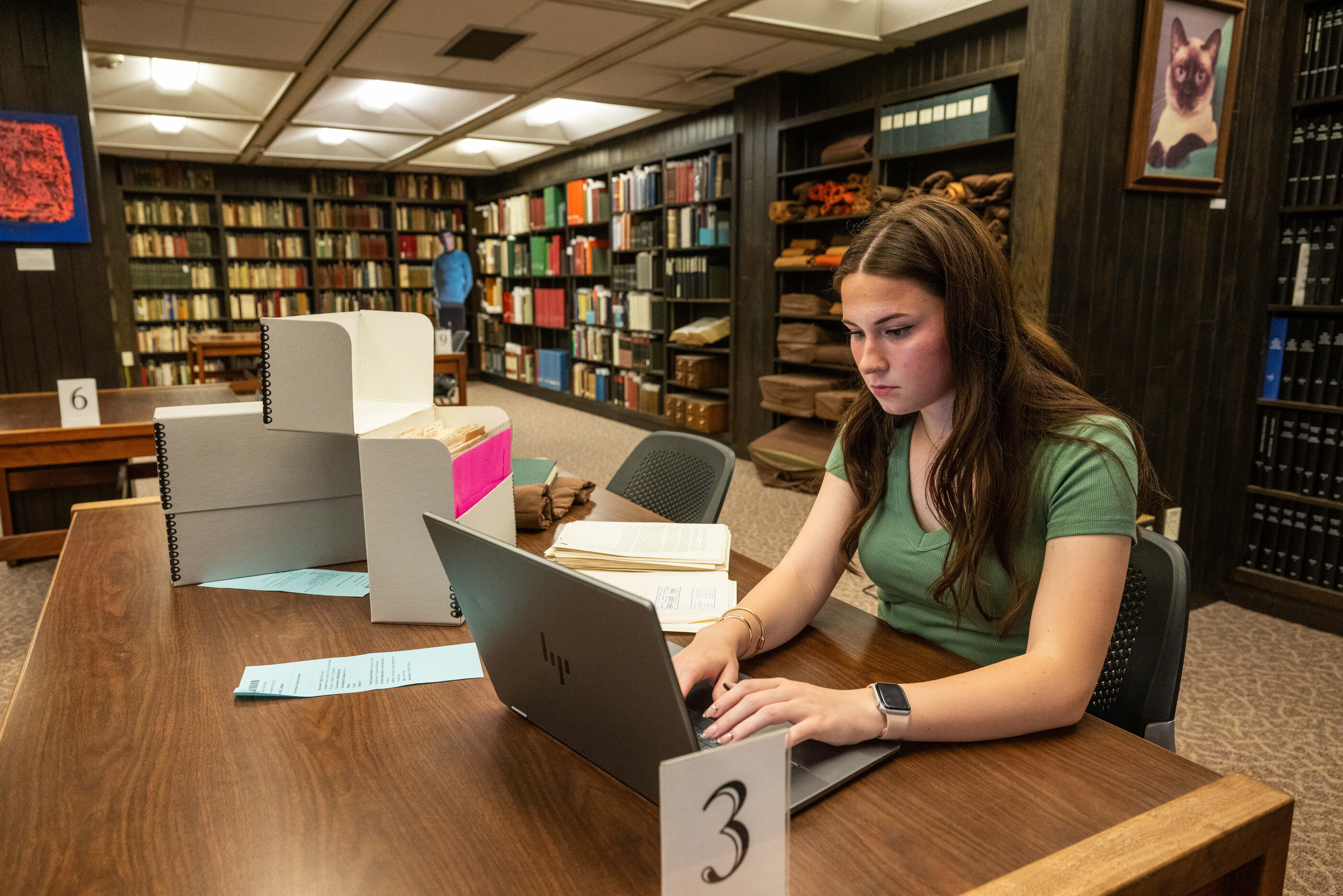 student working in UI special collections