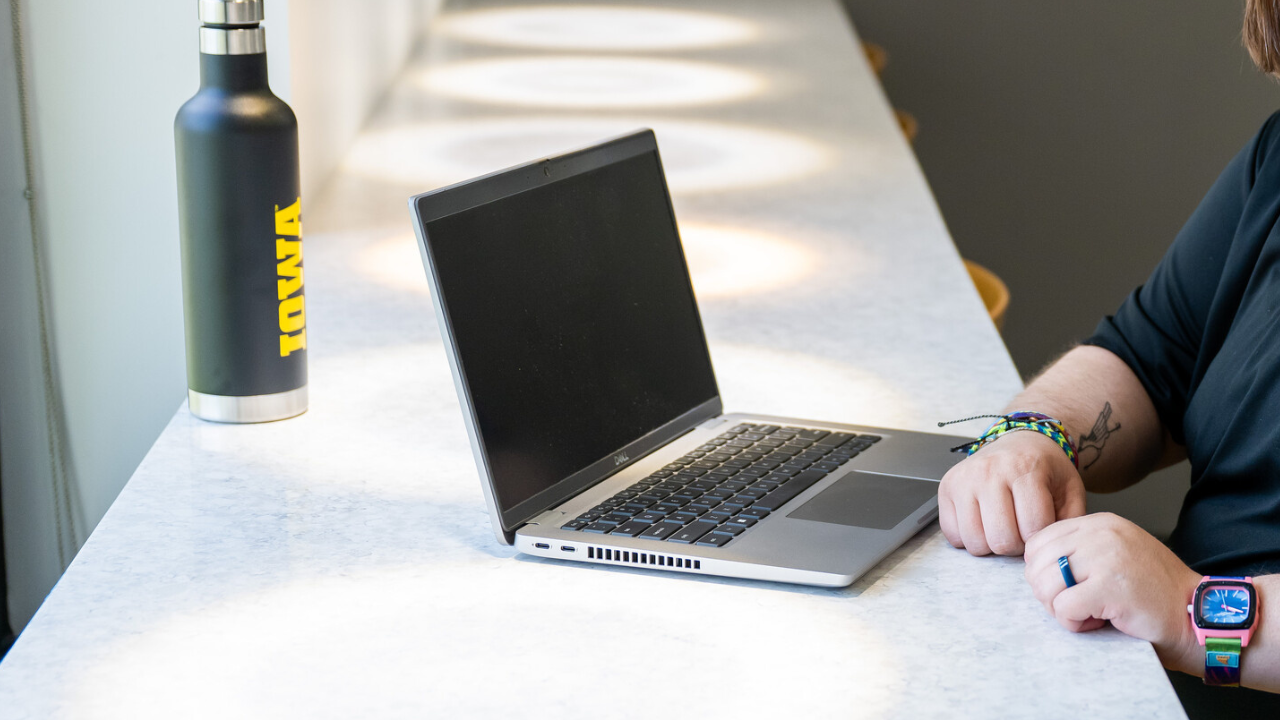 laptop and Iowa waterbottle 