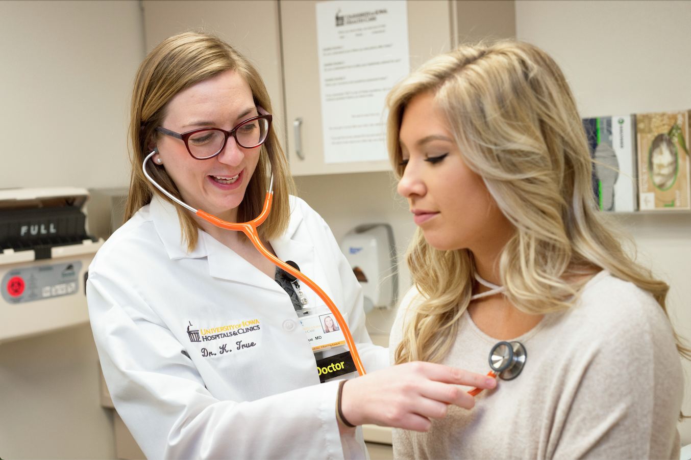Doctor examining patient at UI Health Care