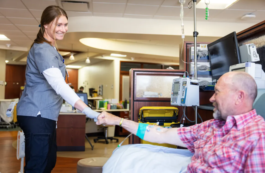 UI Health Care nurse with a patient