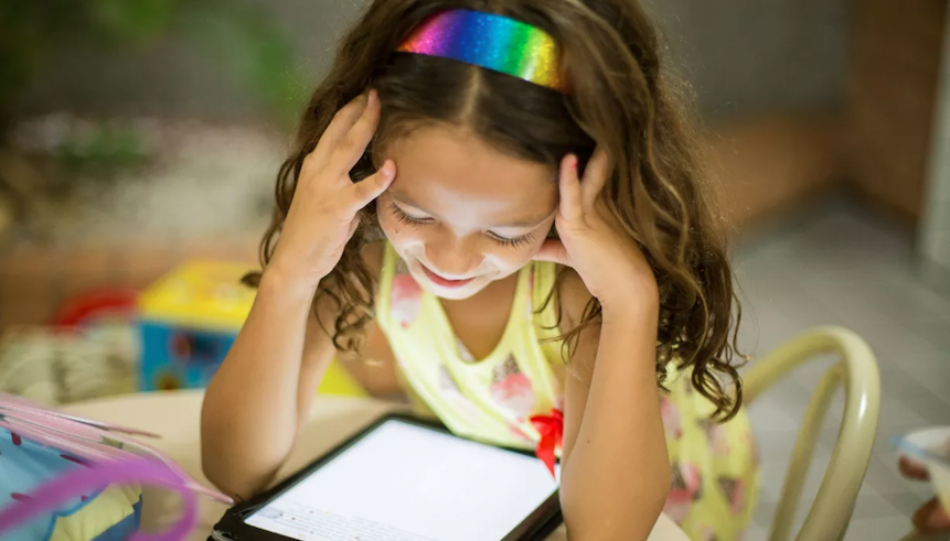Child looking at a tablet