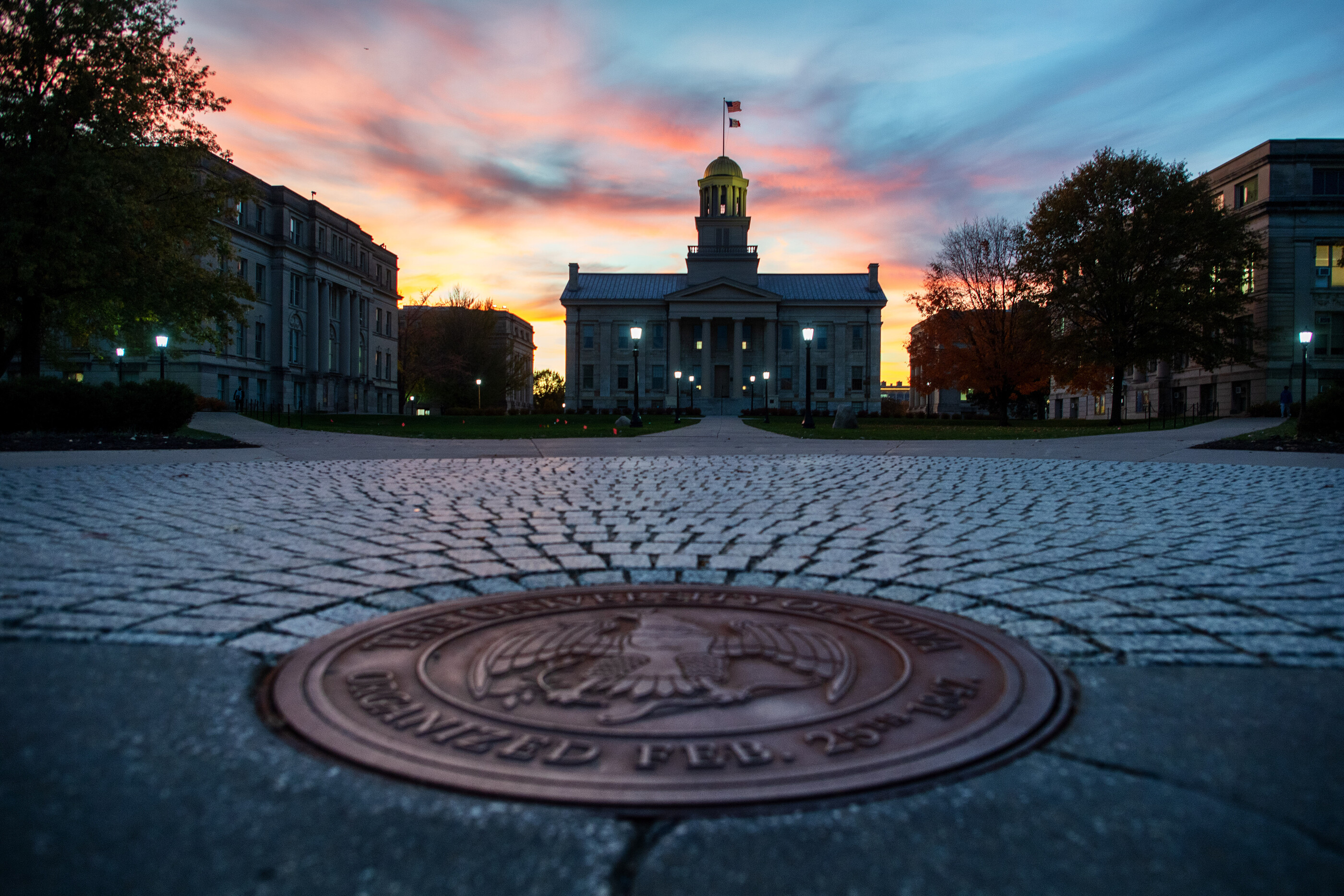UI seal in front of Old Capitol building
