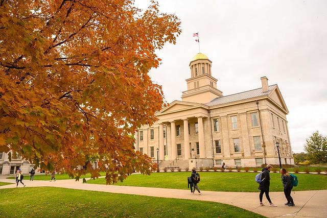Old Capitol building and a tree with fall leaves