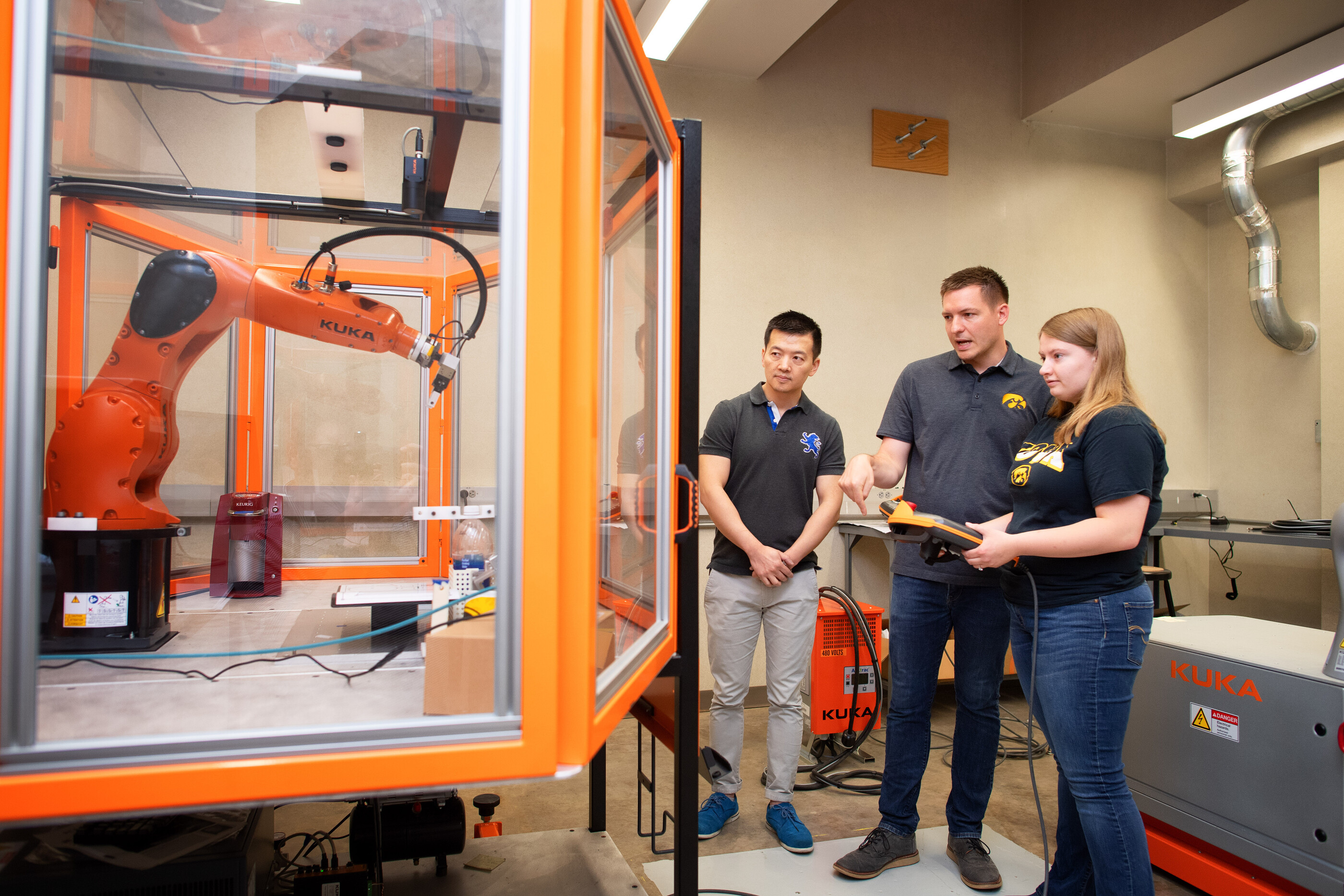 Phillip Deierling with students in a lab