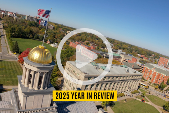 Screen shot of the 2025 Year in Review video with a play button superimposed over the image.
